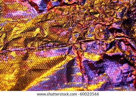 Interesting foil background with warm toned light
