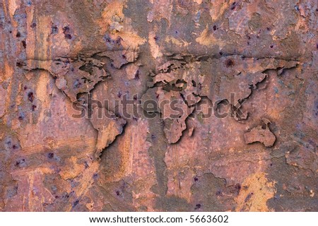 Earth outline on a rusty surface