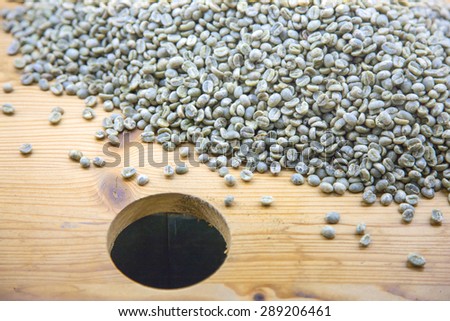 green raw coffee beans ready to be sorted out