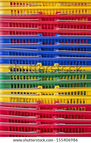 Colorful plastic shopping baskets stacked, Oregon