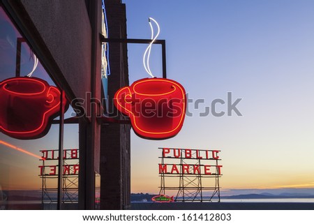 Seattle, Washington/United States -Â?Â? September 2: Neon Public Market Sign And Steaming Cup Of Coffee In Pike Place Market In Seattle, Washington On September 2, 2012.