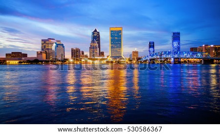 Jacksonville, Florida city skyline over the St. John\'s River (building logos blurred for commercial use)