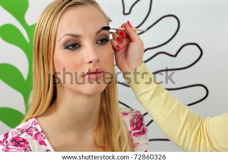 Eyebrow shaping in professional studio