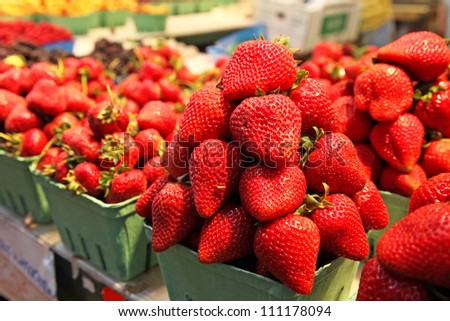 Baskets of strawberries in a market