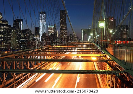 Rush hour traffic on the Brooklyn Bridge at night in New York