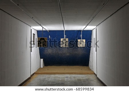 Shooting range in a dark indoor room