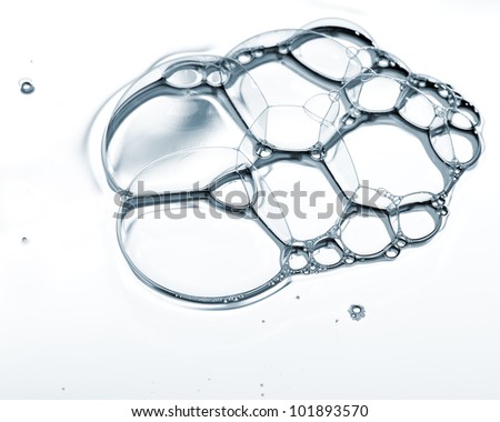 Group of soap bubbles on white