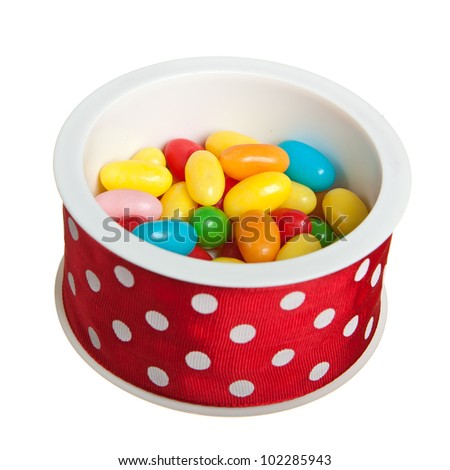 Jelly beans in round red box isolated over white