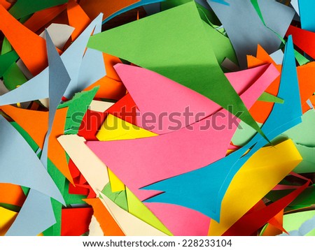 Abstract background of cut color pieces of paper