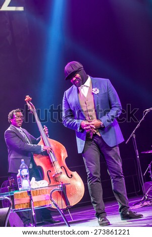 KAUNAS, LITHUANIA - APRIL 26, 2015: Grammy winner jazz singer Gregory Porter and bass player Aaron James perform at the stage of \