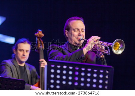 KAUNAS, LITHUANIA - APRIL 24, 2015: Double bass player Pawel Panta and trumpetist Gary Guthman perform at the stage of 