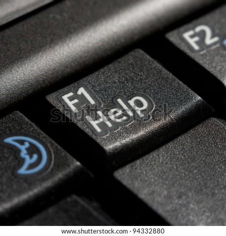 Close up of black help key of computer keyboard