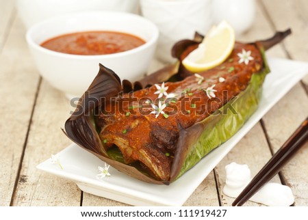 Grilled Spicy Sting Ray in Banana Leaves. Unsharpened file