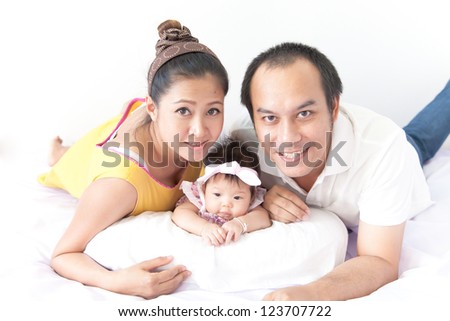 Happy of a new family on white background
