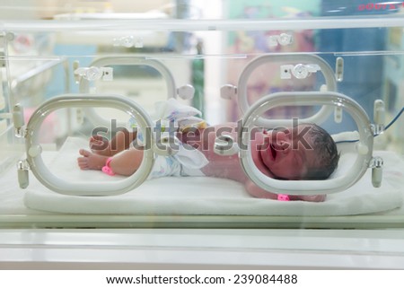 A newborn in nursery after childbirth