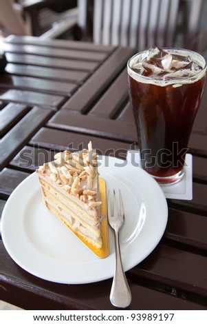 Cake and ice black coffee for eat in break time