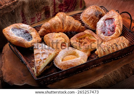Selection of French & Danish pastries on a Wicker basket
