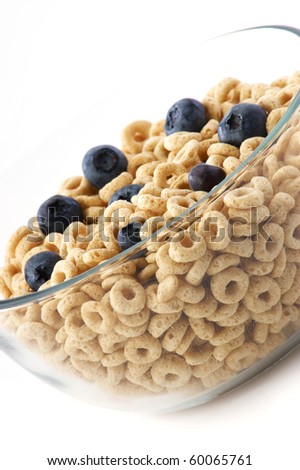 bowl of oat cereal with blue berrys