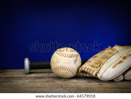 Baseball, bat, and mitt on old vintage wood table with copy space background old rusted screen and neon blue