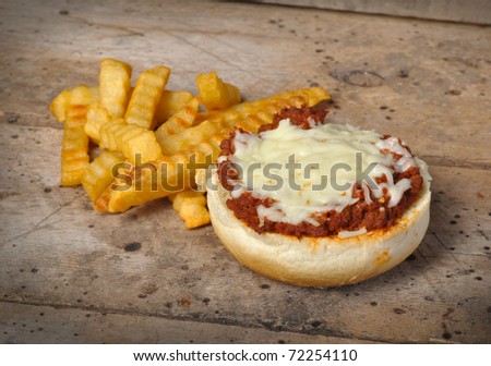 Pizza Burger with French Fries on old vintage wood table with copy space