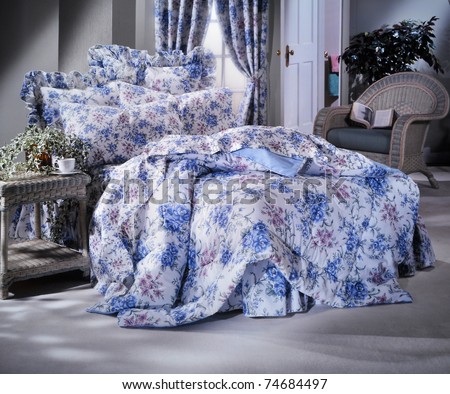 Bedding set shot in studio with window light and soft moody feel