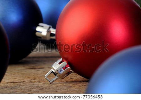 Red and blue Christmas balls on an old vintage table