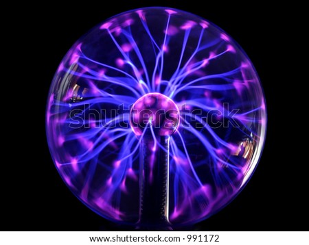Colorful plasma lamp experiment on a black background