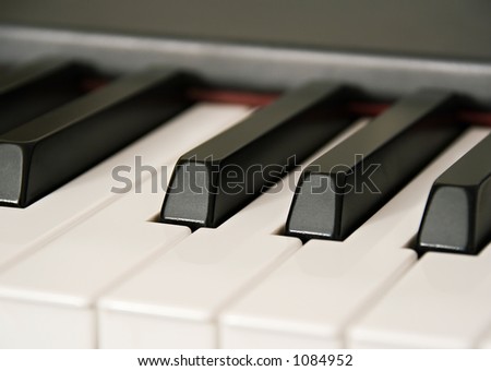 Close up view of piano keys with shallow dof