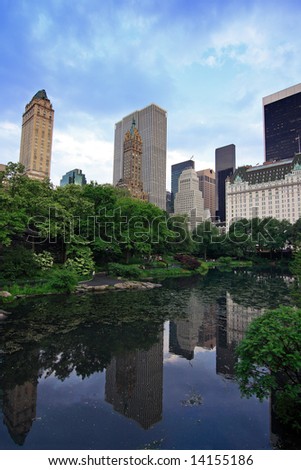 Manhattan buildings reflecting in The Pond - Central Park, New York City, USA
