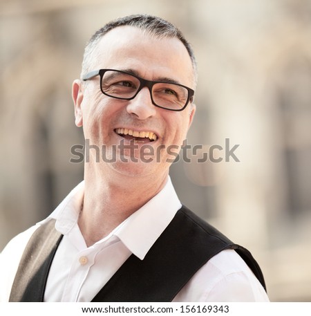 candid portrait Waiter in Grand Place, Mons, Belgium
