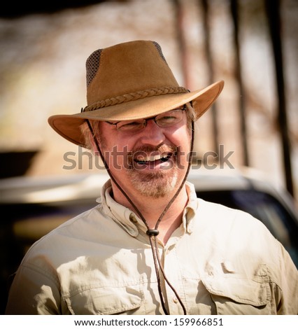 smiling safari man in Africa