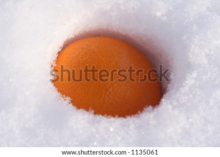 orange golf on snow