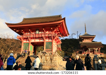 KYOTO, JAPAN - JANUARY 13, 2014: Tourists visit Koyomizu temple, a famous tourist attraction, in Kyoto. The temple was built in year 778
