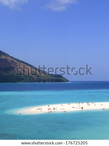 SATUN,THAILAND-February 4: Unidentified people visit  Mountain beach in Lipe island on February 4,2014 in Satun province, Thailand.There are 3 beaches named Pattaya, Sunrise, and Sunset in Lipe island