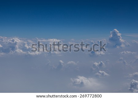 clouds and blue sky seen from plane