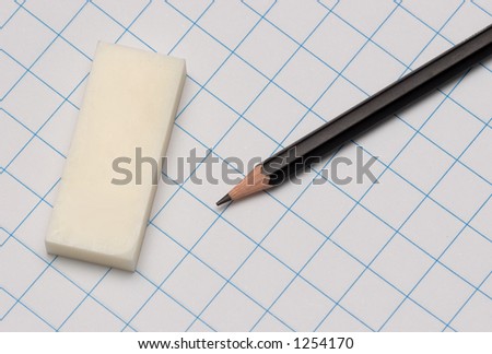 pencil, eraser, and grid paper