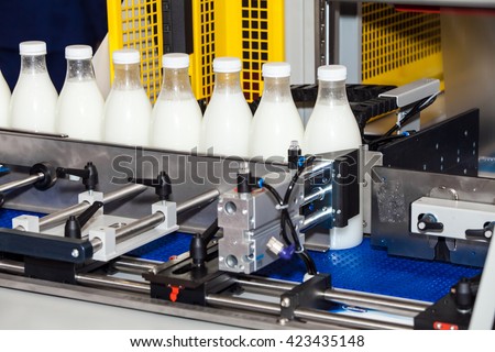 Packaging bottles line in the milk industry