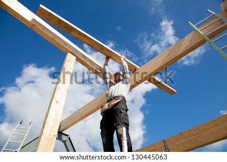 real builder building a roof construction