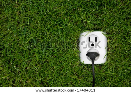 energy concept outlet in grass
