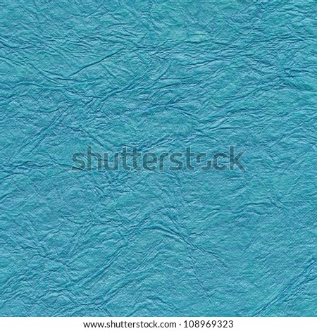 Blue  paper background with pattern. Handmade paper
