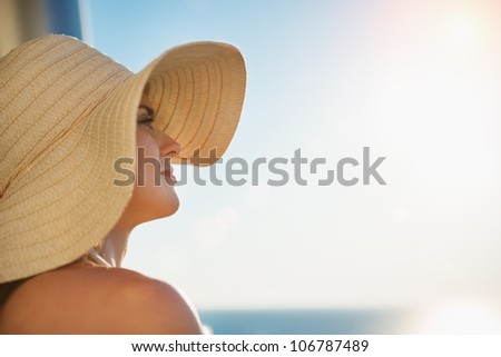 Portrait of happy woman looking into distance