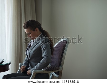 Business woman in hotel room. Business trip