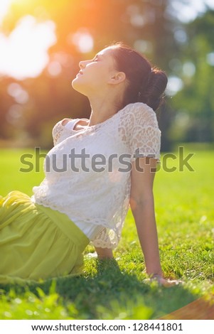 Girl relaxing on meadow Girl relaxing on meadow