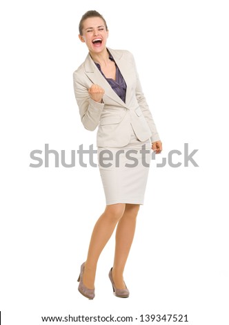 Full length portrait of business woman fist pump
