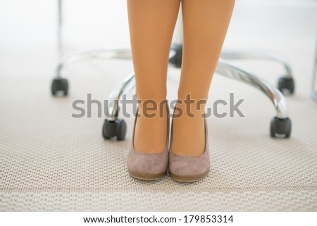 Closeup on business woman legs