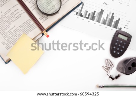 business desk with office stationery