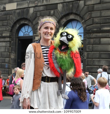 EDINBURGH- AUGUST 11: Member of Uncontained Arts publicize their show Treasure Island during Edinburgh Fringe Festival on August 11, 2012 in Edinburgh