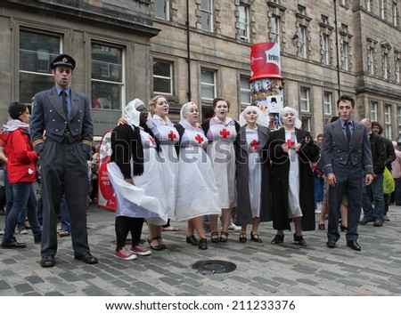 EDINBURGH- AUGUST 16: Members of The About Turn Theatre Company publicize their show Dido and Aeneas during Edinburgh Fringe Festival on August 16, 2014 in Edinburgh Scotland