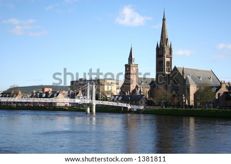Inverness in the spring with the river Ness lined with daffodils Scotland
