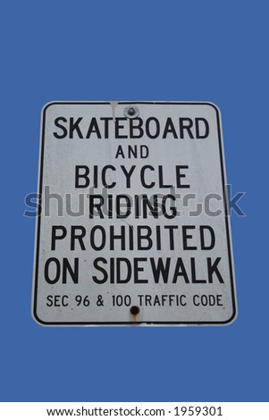 skateboards and bicycles riding prohibited riding on sidewalk  sign